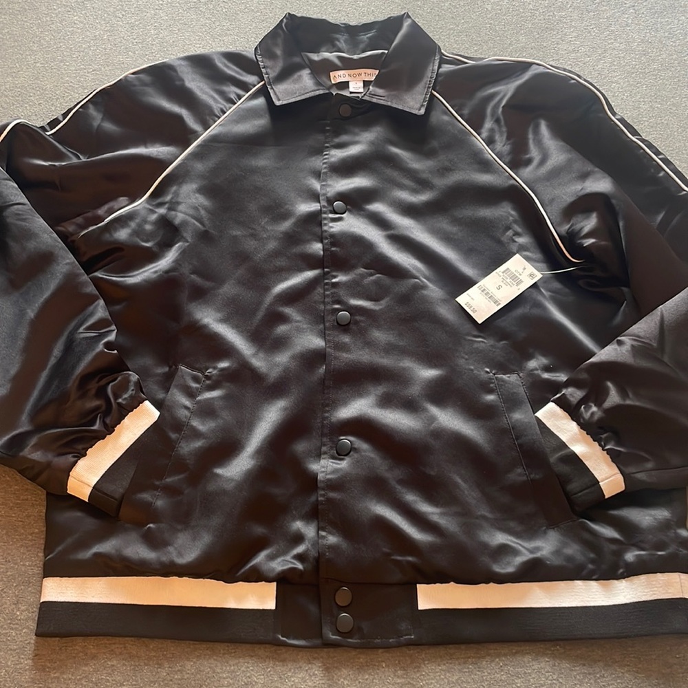 Black varsity jacket by “And Now This” (new)